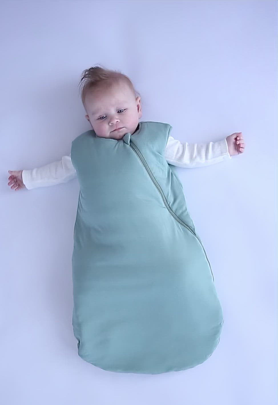 Video of baby trying to sleep in his sleeping bag