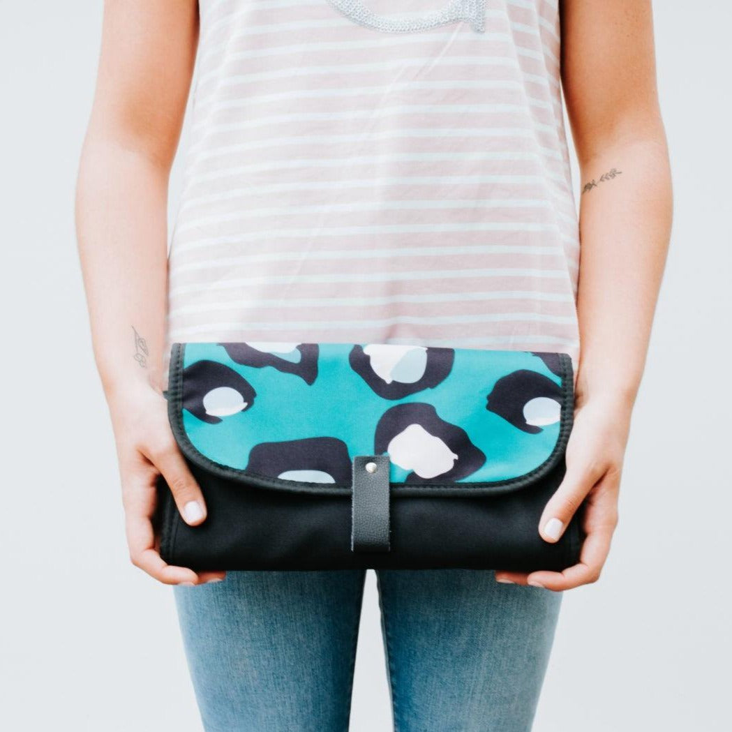 Women showing Nappy Change Mat Clutch | Green Envy