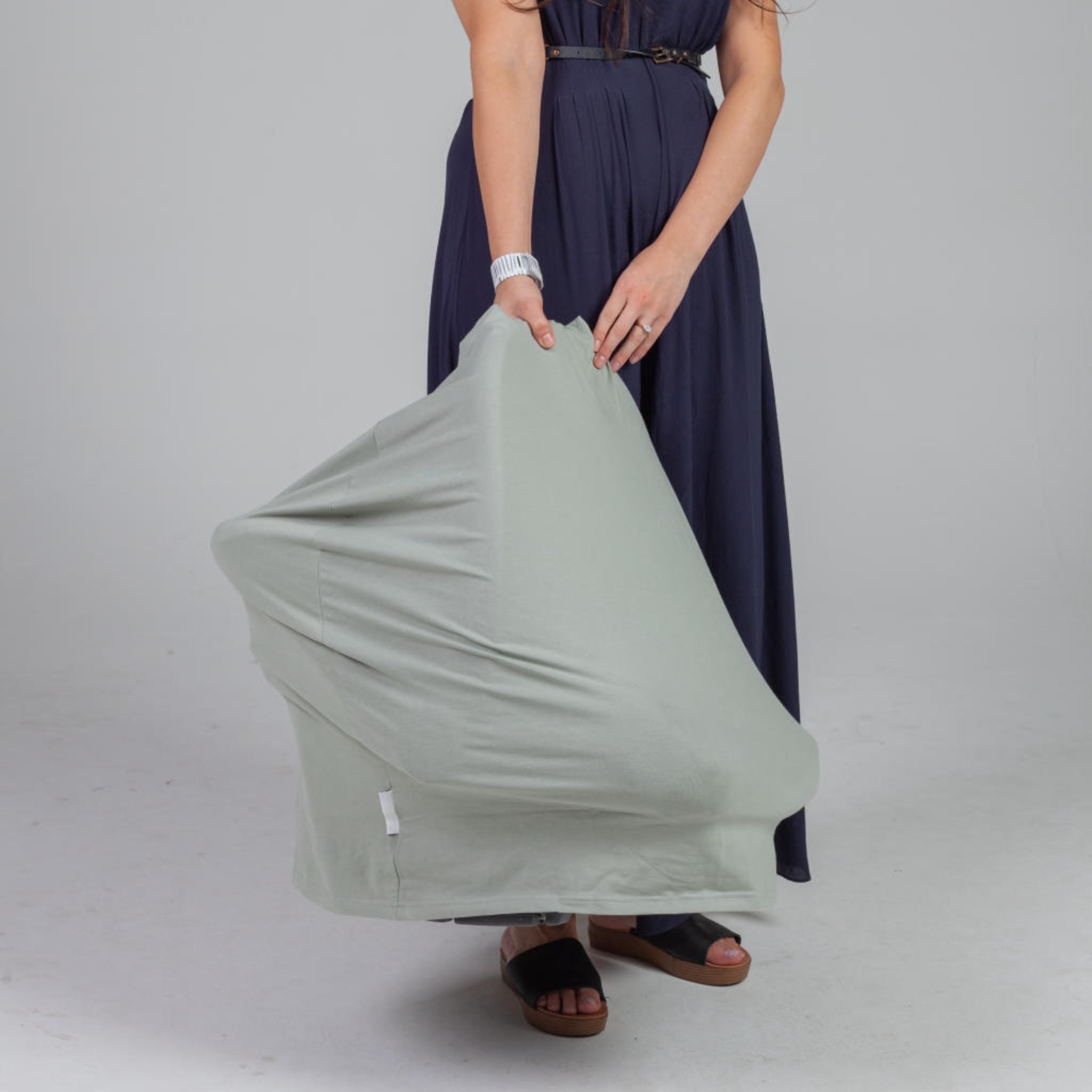 Women carrying 5 in 1 Multi Use Cover