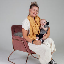 Women carrying his baby on the chair